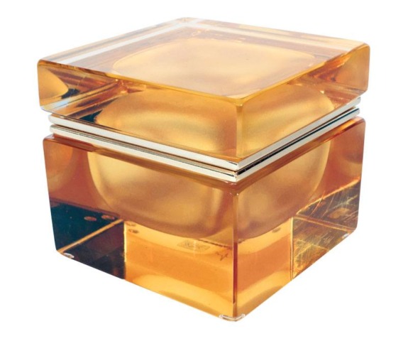 Square amber-colored transparent box with a shiny surface.