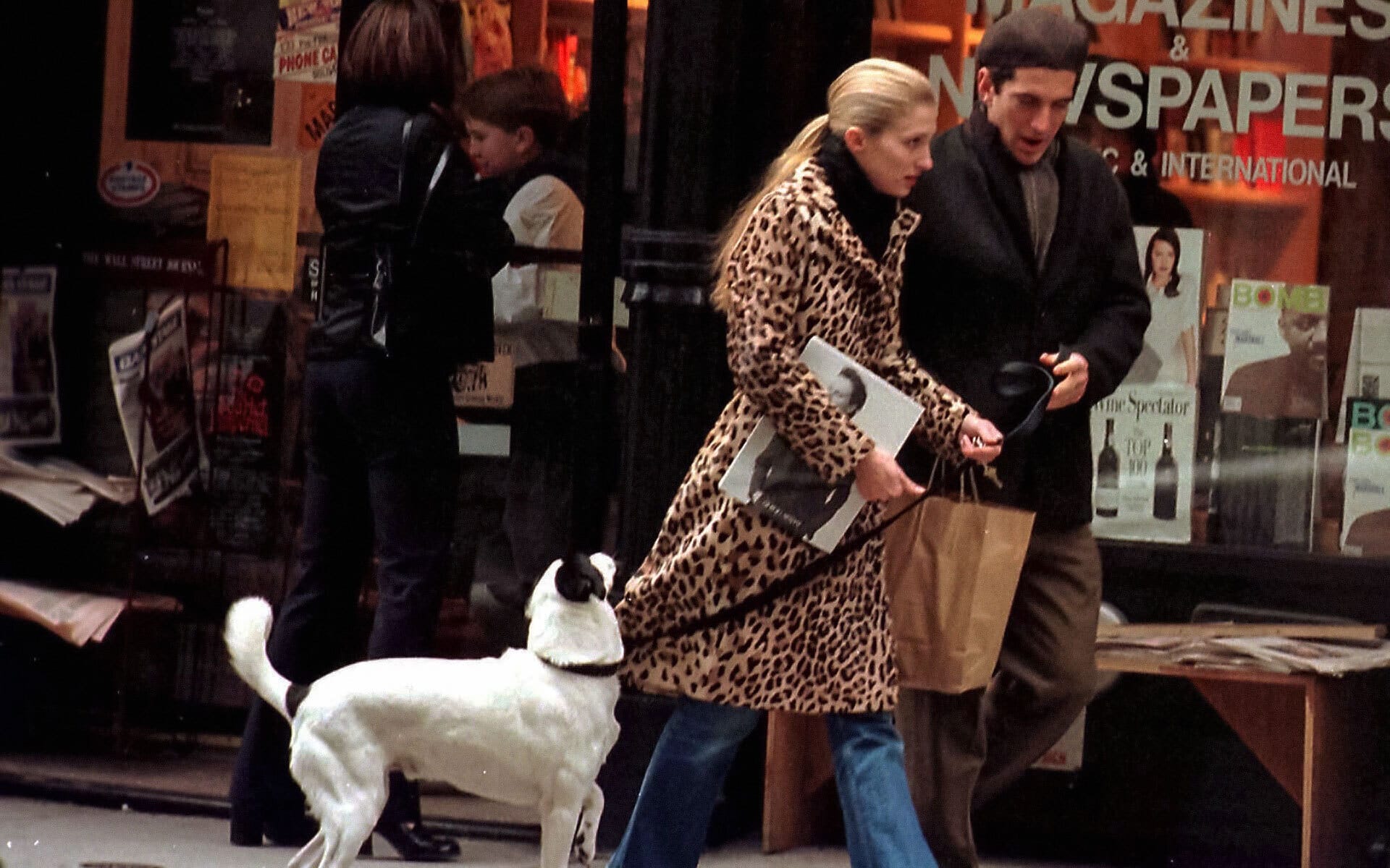 Carolyn Bessette-Kennedy, pictured here with husband JFK Jr., was photographed wearing the leopard-print jacket often.
