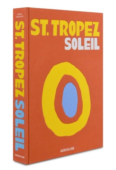 Book cover featuring bold yellow "St. Tropez Soleil" text on a vibrant orange background with circular abstract design.