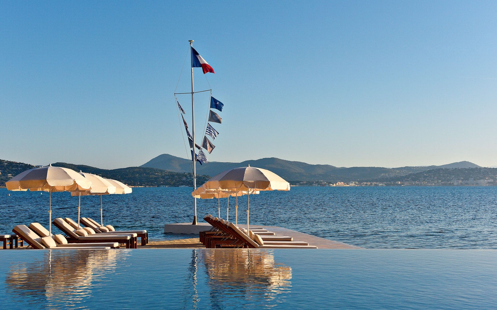 The Maison infinity pool at the Cheval Blanc hotel overlooks the only private beach in St. Tropez.