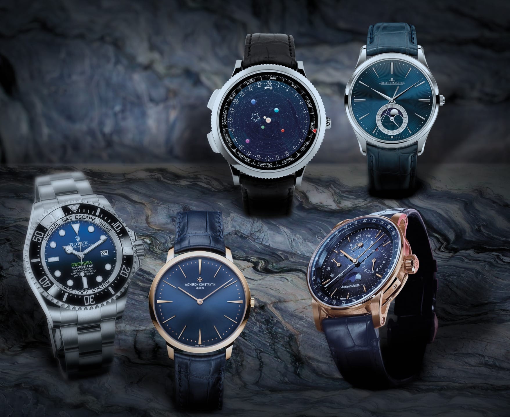 Five luxury watches displayed on a dark, textured background, featuring different styles and designs.