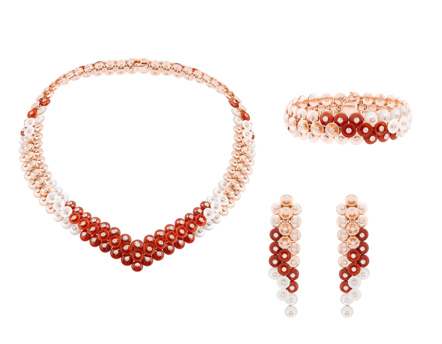 Elegant jewelry set with a necklace, bracelet, and earrings featuring red and white beads arranged in a geometric pattern.