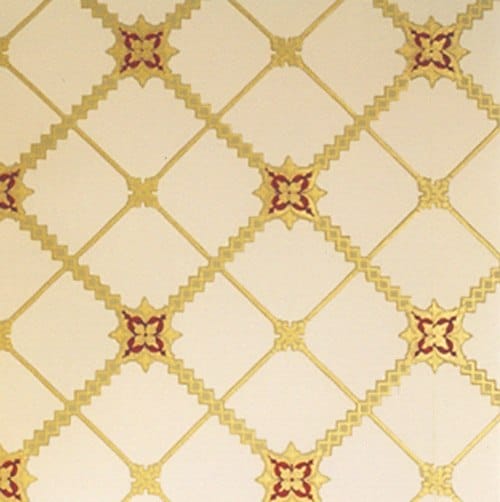 Vintage wallpaper design with a repeating pattern of red and gold diamonds on a beige background.