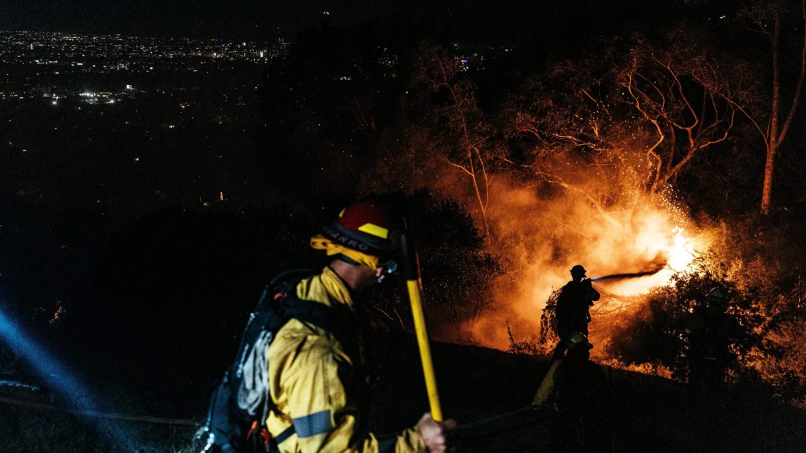 Fire crew at night in Los Angeles, California.