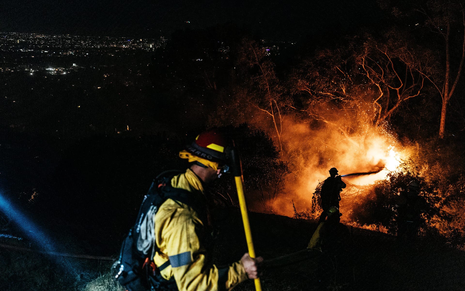 Fire crew at night in Los Angeles, California.