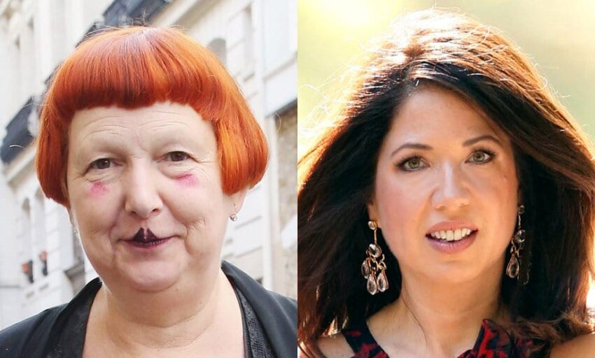 Two women posing outdoors with contrasting hair colors, one with bright red and the other with dark brown hair.