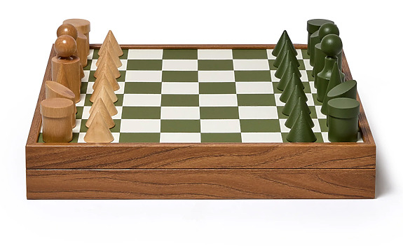 wooden chess set with minimalist green and natural pieces arranged on a checkered board