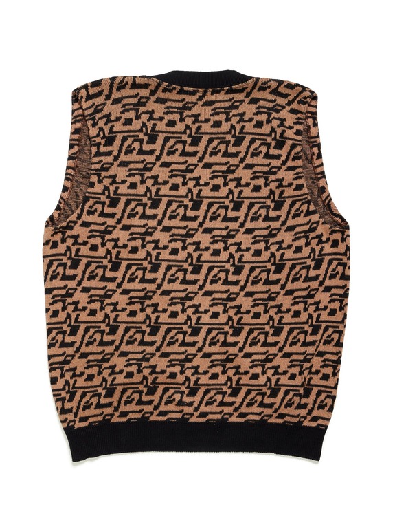 Sleeveless sweater with a black and brown geometric pattern on a white background, showing the back view.