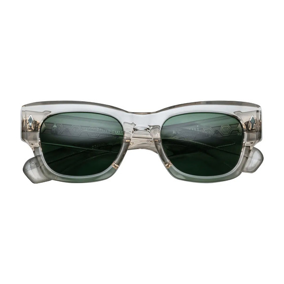 Clear frame sunglasses with green tinted lenses, front view.