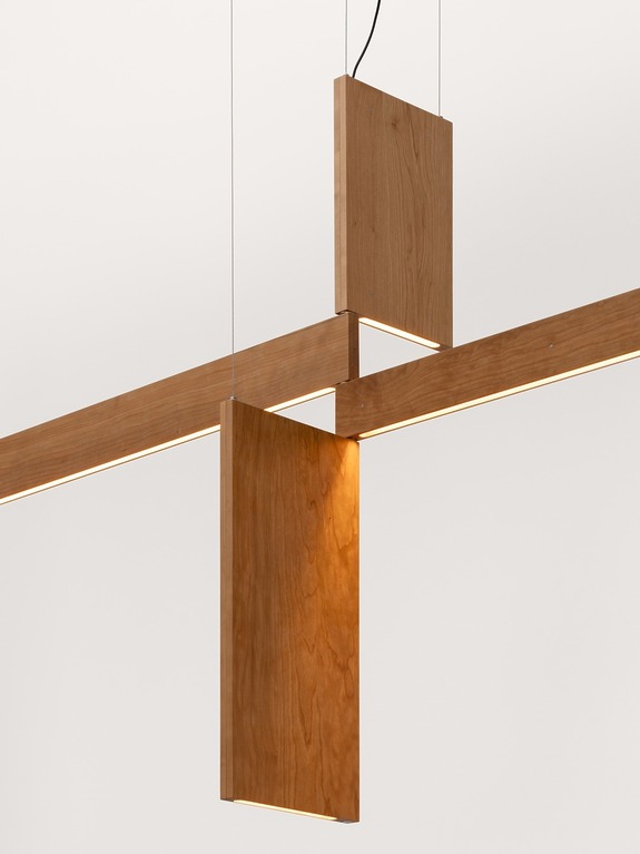 Modern wooden pendant light fixture with geometric design, featuring vertical and horizontal panels against a white background