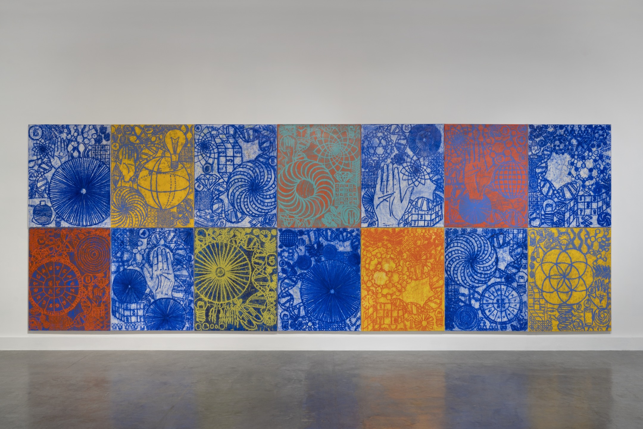 Colorful abstract mural with geometric patterns and shapes displayed in a grid format with blue, orange, and red hues.