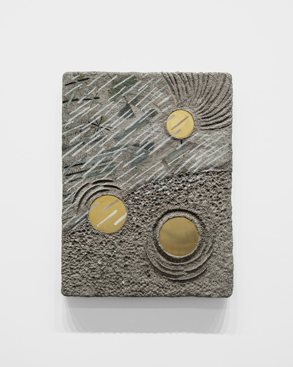Abstract textured artwork with circular gold elements and greenish diagonal lines on a rough, gray rectangular surface.