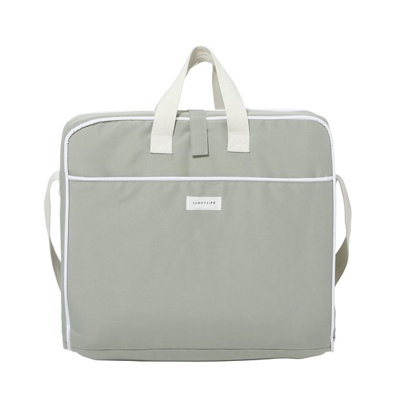 Light gray zippered travel bag with handles and a front pocket, featuring a small logo patch in the center.