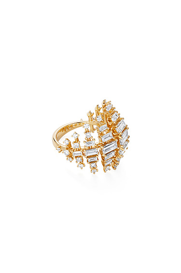 Gold ring with multiple rectangular and round diamonds in an intricate design on a white background.