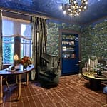 Luxurious living room with blue and green forest-themed wallpaper, velvet chairs, and a modern chandelier on a starry ceiling.