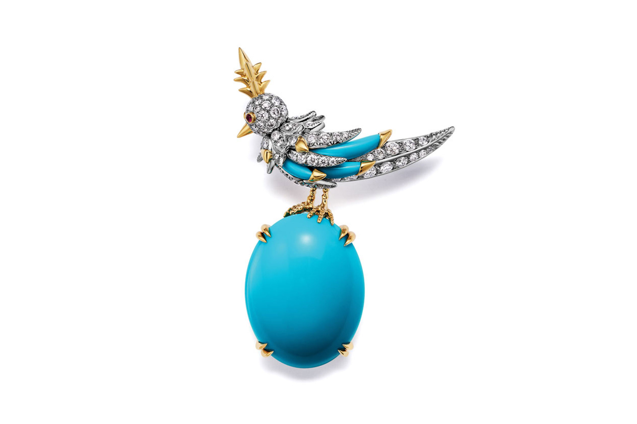 Blue and silver bird-shaped brooch adorned with diamonds and a large turquoise gemstone.