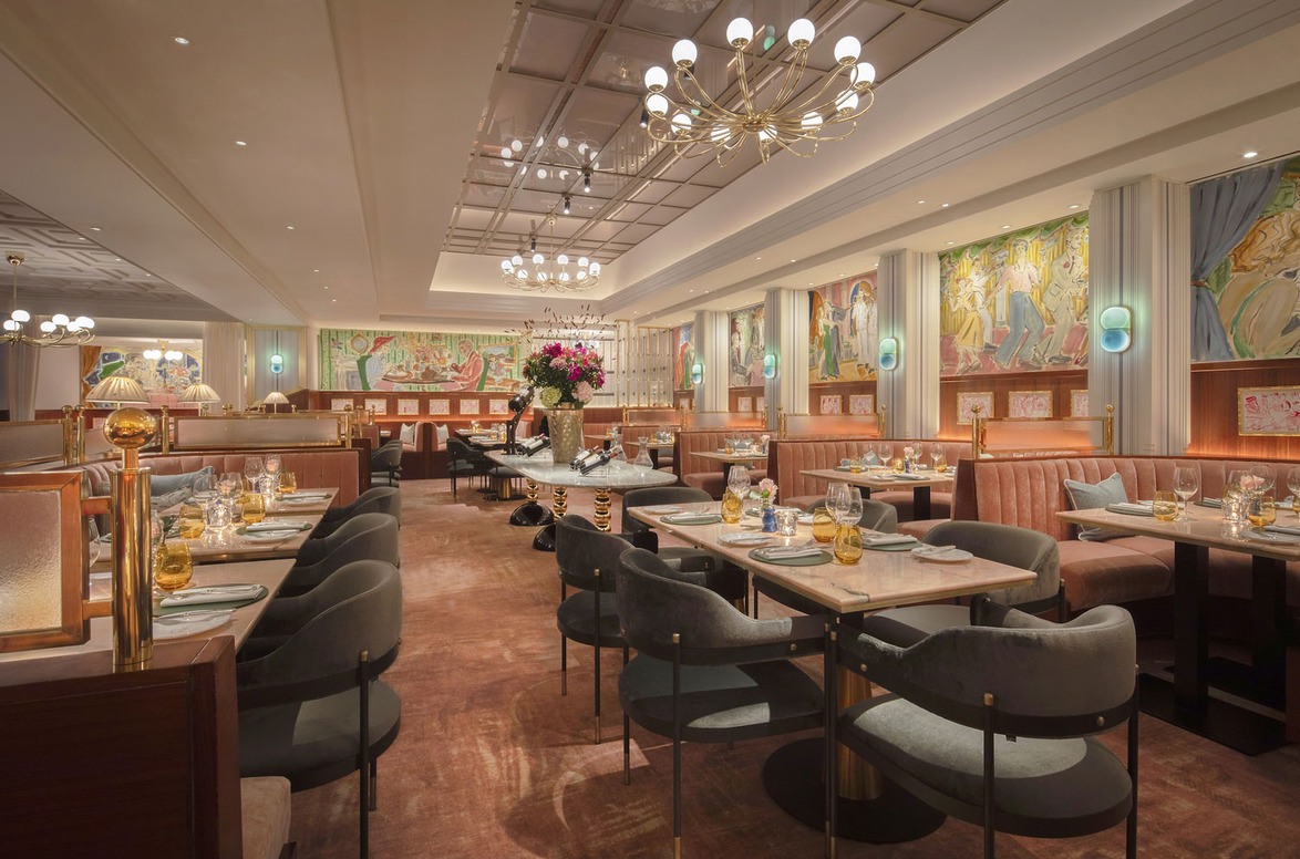 Elegant restaurant interior with modern decor, plush seating, and ambient lighting ideal for fine dining experiences.