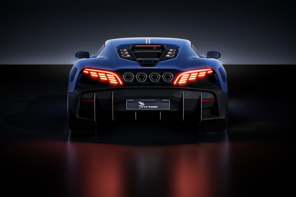 rear view of a sleek blue sports car with illuminated taillights on a dark reflective surface