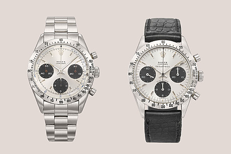 Two luxury wristwatches with chronograph dials, one with a metal band and one with a black leather strap.
