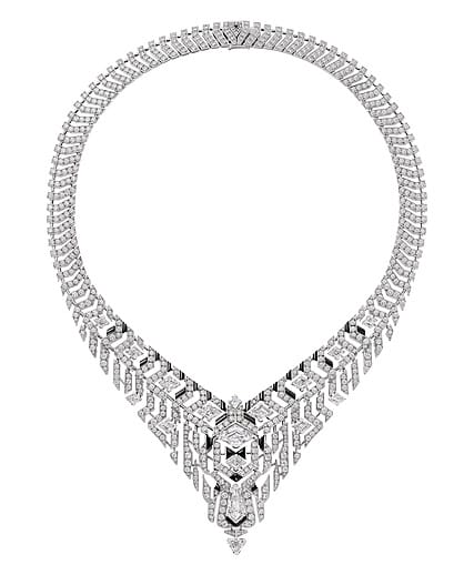Elegant geometric diamond necklace with intricate design and triangular pendant centerpiece.