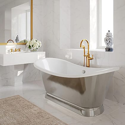 Elegant bathroom with a freestanding tub, gold fixtures, marble walls, a large mirror, and decorative vase on the sink.