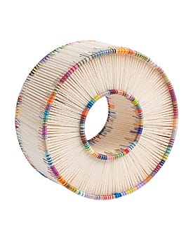 Colorful, circular thread sculpture with a hollow center, featuring various colorful patterns around the edges.