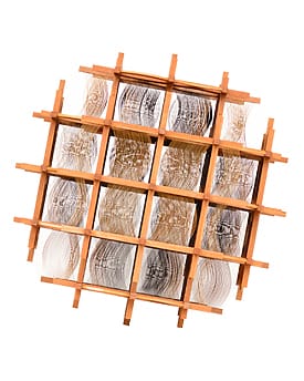 Wooden grid sculpture with intricate curved patterns and transparent layers, viewed from an angle against a white background.