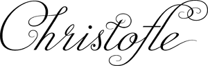 Silhouette of four people jumping in excitement on a hill at sunset with a clear sky in the background.