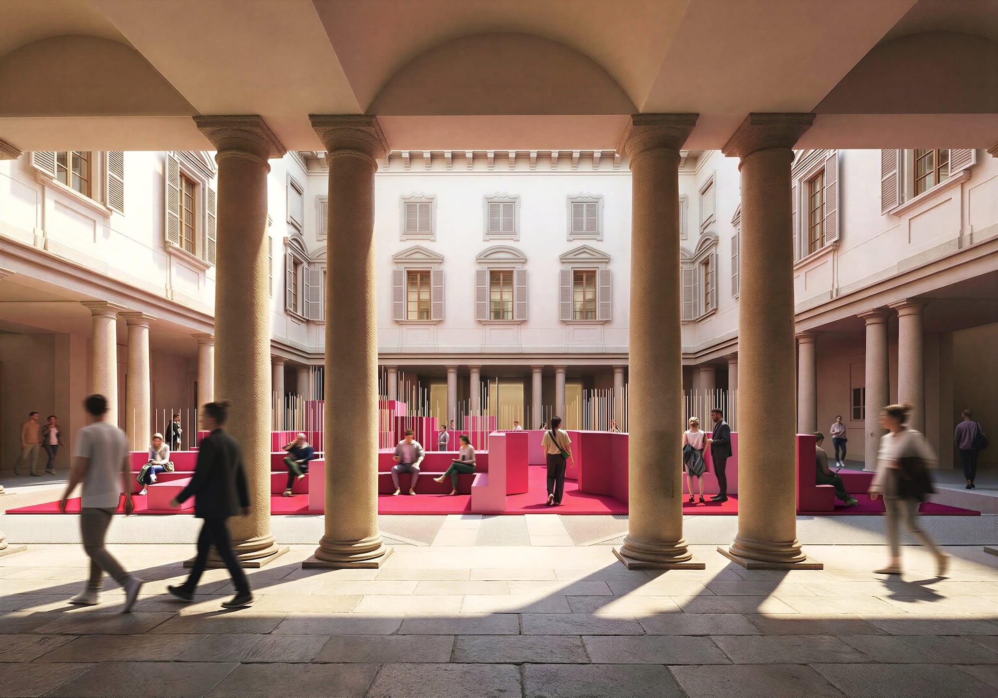 People walking through a sunlit courtyard with columns and a modern seating area in the center