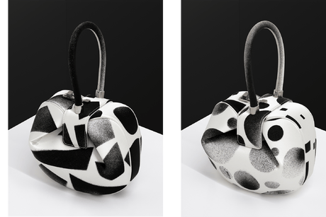 Gabriela Hearst x Adam Pendleton Nina black and white abstract patterned handbags with unique shapes and structured handles, displayed on a monochrome background.