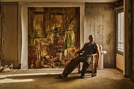 Hugo Toro in his Paris studio with My Grandfather Seated (2025).
