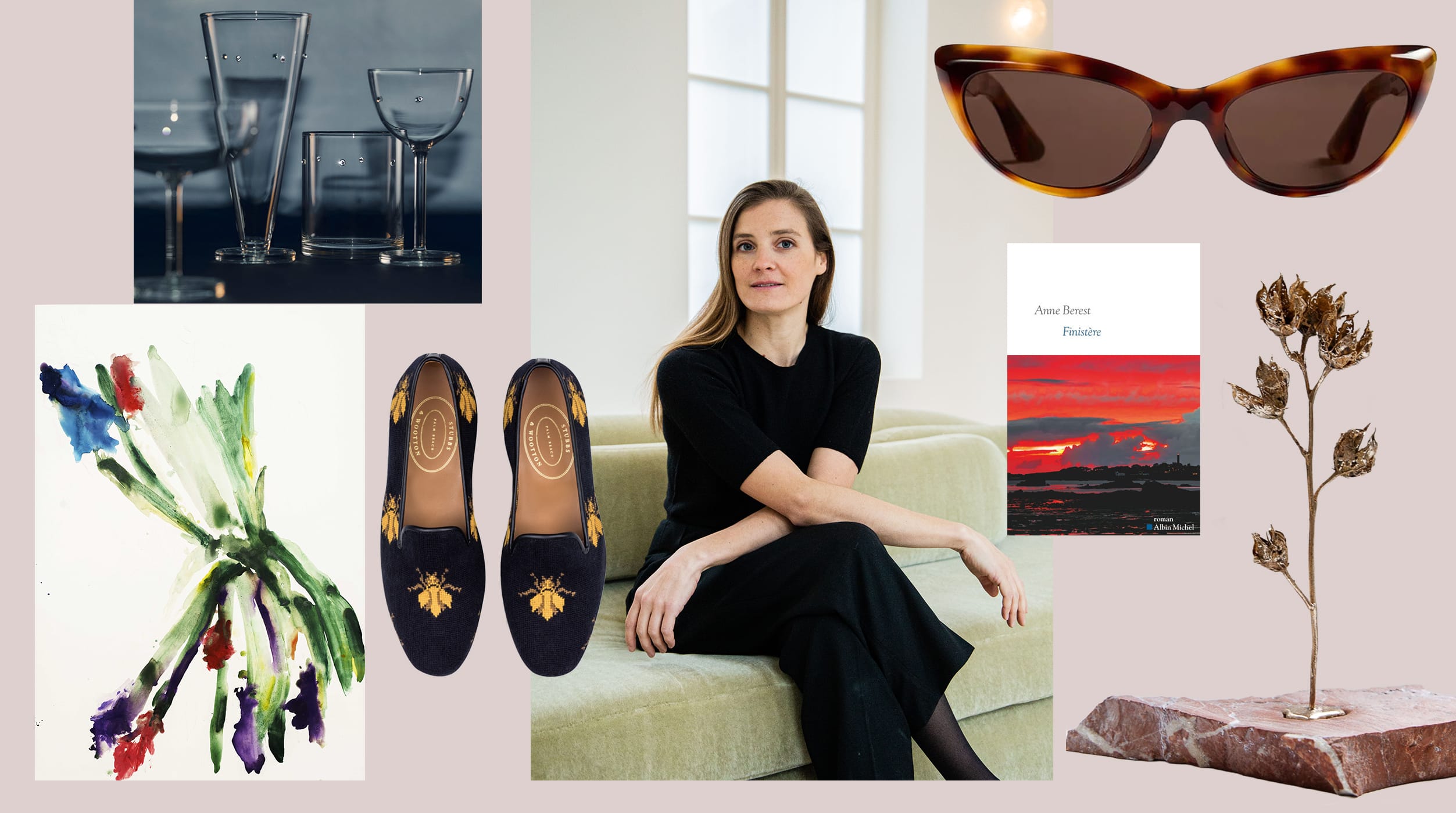 Woman seated on a couch surrounded by various artistic items including glasses, shoes, sunglasses, and a painting.